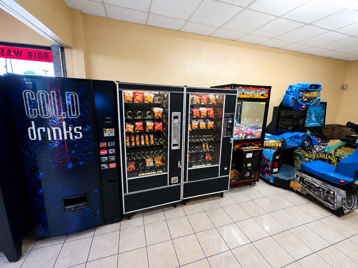 World O' Suds Coin Laundry, 430 E Main St Apopka FL — arcade games area on the main floor