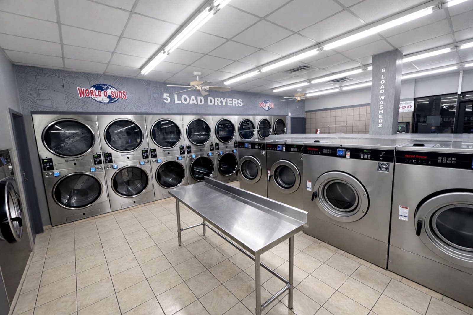 World O' Suds Coin Laundry, 430 E Main St Apopka FL — 5-load dryer room with World O' Suds wall mural